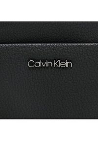 Calvin Klein Saszetka Ck Diagonal Flatpack K50K510554 Czarny. Kolor: czarny. Materiał: skóra