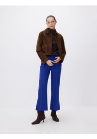 Reserved - Spodnie z rozcięciami petite - niebieski. Kolekcja: petite. Kolor: niebieski. Materiał: tkanina, wiskoza #1