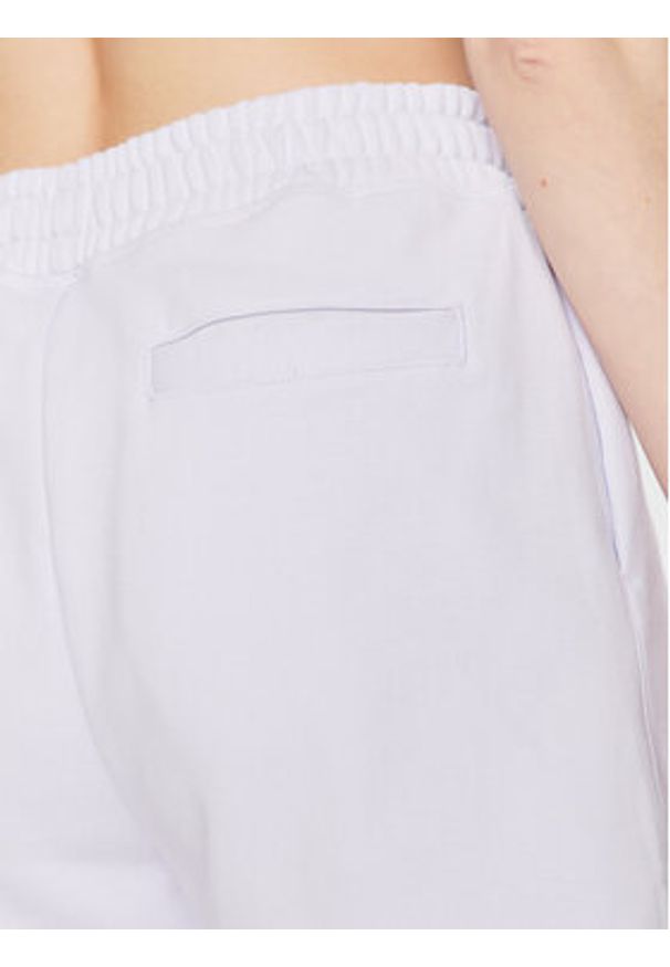 New Balance Szorty sportowe WS23552 Fioletowy Relaxed Fit. Kolor: fioletowy. Materiał: bawełna