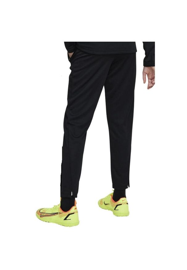 Nike - Dziecięce/niemowlęce Spodnie Do Biegania DriFIT Logo. Kolor: czarny