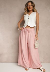Renee - Różowe Szerokie Spodnie High Waist Ozdobione Wiązaniem Telonia. Okazja: na co dzień. Stan: podwyższony. Kolor: różowy. Wzór: aplikacja. Styl: casual, elegancki