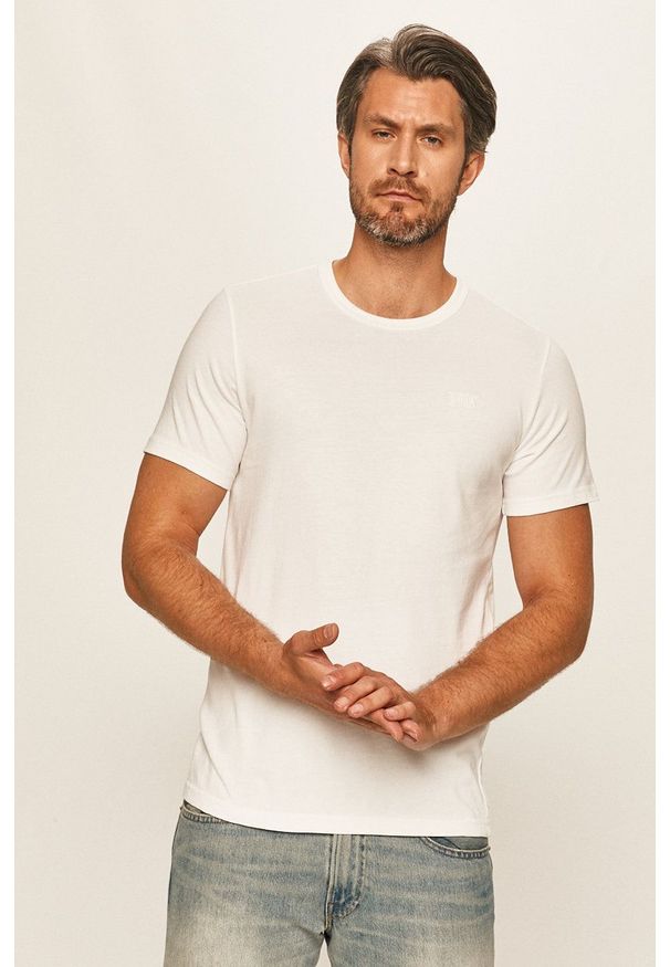 Levi's® - Levi's - T-shirt. Okazja: na spotkanie biznesowe. Kolor: biały. Materiał: materiał. Wzór: aplikacja. Styl: biznesowy