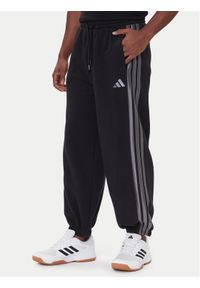 Adidas - adidas Spodnie dresowe Ess JM1703 Czarny Regular Fit. Kolor: czarny. Materiał: bawełna #1