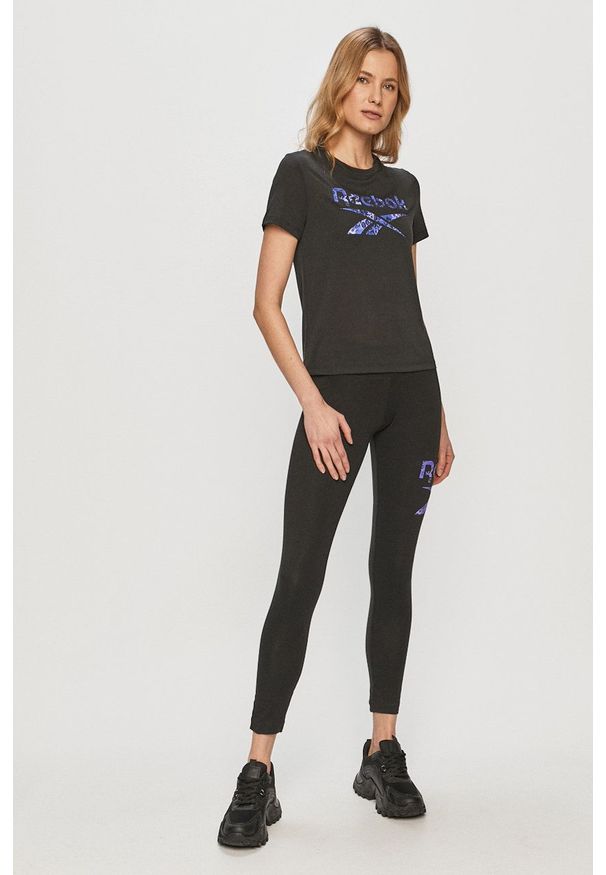 Reebok - Legginsy. Stan: podwyższony. Kolor: czarny. Materiał: dzianina. Wzór: nadruk