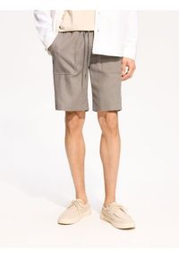 Reserved - Szorty jogger regular fit - jasnoszary. Kolor: szary. Materiał: tkanina, bawełna #1