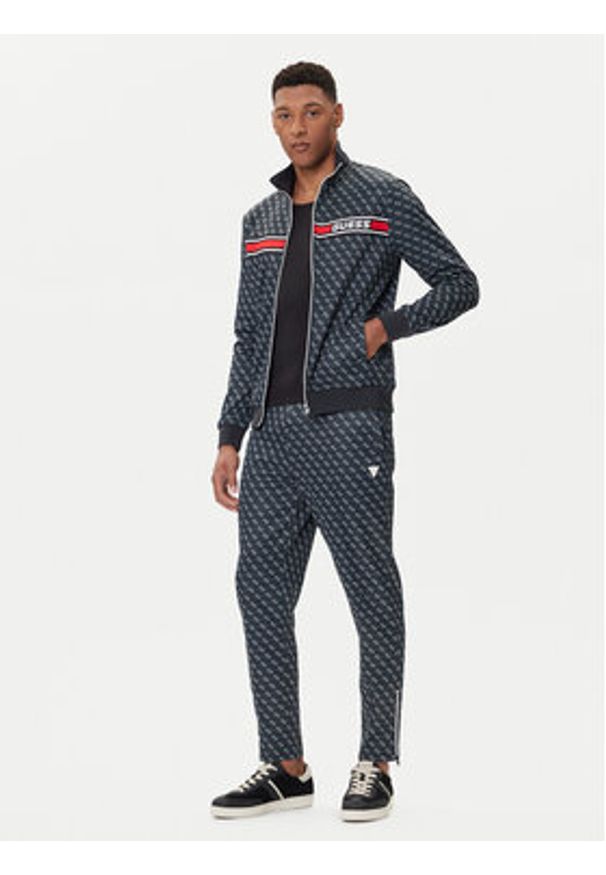 Guess Spodnie dresowe Z2BB05 K7122 Granatowy Regular Fit. Kolor: niebieski. Materiał: bawełna