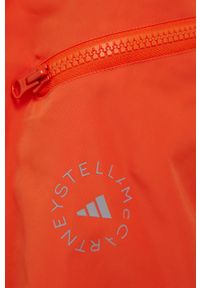Adidas by Stella McCartney - adidas by Stella McCartney wiatrówka H59970 kolor pomarańczowy przejściowa oversize. Typ kołnierza: kołnierzyk stójkowy. Kolor: pomarańczowy. Materiał: materiał, tkanina. Wzór: ze splotem