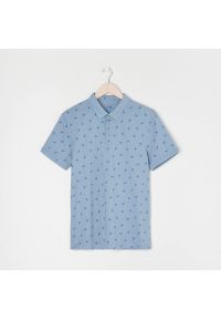 Sinsay - Koszulka polo - Niebieski. Typ kołnierza: polo. Kolor: niebieski