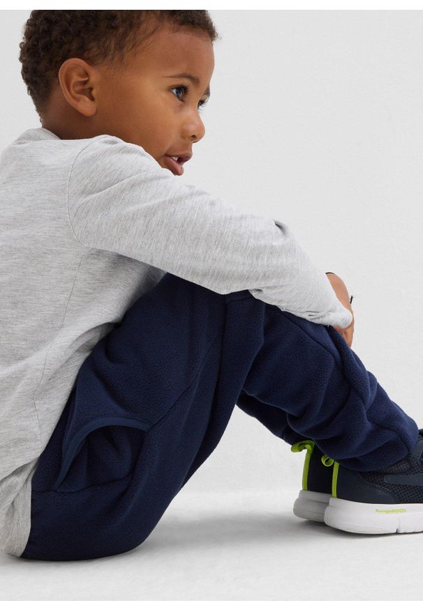 bonprix - Ciepłe, polarowe spodnie termiczne. Kolor: niebieski. Materiał: polar