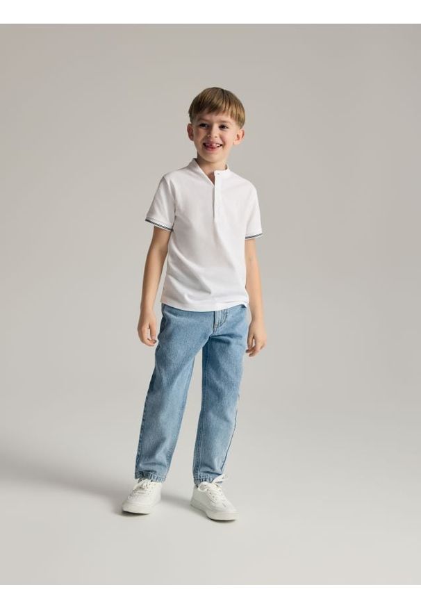 Reserved - Spodnie carrot fit - niebieski. Kolor: niebieski