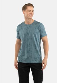 Volcano - T-shirt z nadrukiem all over T-MELL. Kolor: niebieski. Materiał: bawełna, materiał. Długość rękawa: krótki rękaw. Długość: krótkie. Wzór: nadruk. Styl: klasyczny