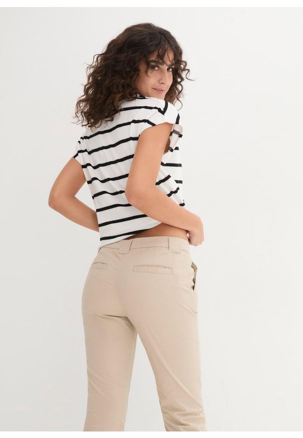 bonprix - Spodnie chino ze stretchem. Okazja: na co dzień. Stan: obniżony. Kolor: beżowy. Materiał: bawełna. Wzór: kwiaty. Styl: casual