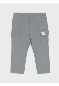 Sinsay - Spodnie dresowe cargo - wielobarwny. Materiał: dresówka #1