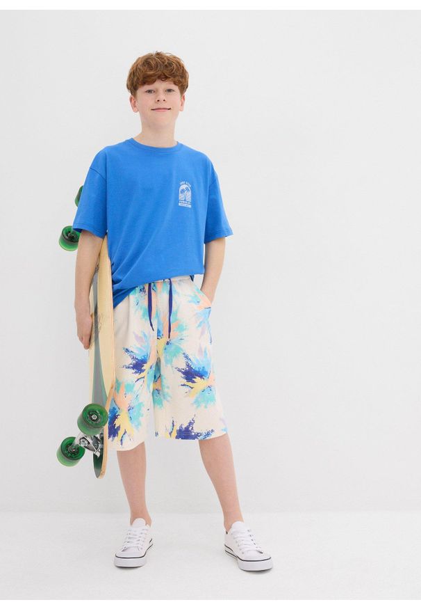 bonprix - Bermudy dresowe z bawełny organicznej. Kolor: beżowy. Materiał: dresówka, bawełna. Wzór: nadruk