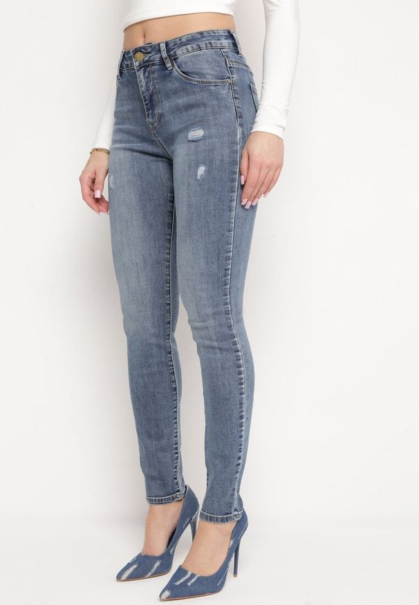 Born2be - Niebieskie Jeansy Typu Skinny z Przetarciami i Regularnym Stanem Aftellia. Kolekcja: plus size. Kolor: niebieski. Styl: rockowy, elegancki