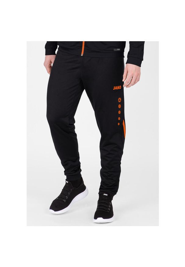 Spodnie dresowe polyesterowe Jako Challenge. Kolor: wielokolorowy, czarny, pomarańczowy. Materiał: dresówka. Sport: piłka nożna, fitness