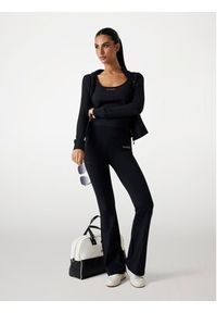 Guess Spodnie materiałowe 175791 Czarny Slim Fit. Kolor: czarny. Materiał: materiał