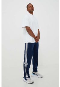 adidas Originals spodnie dresowe kolor granatowy z aplikacją. Kolor: niebieski. Materiał: dresówka. Wzór: aplikacja #2