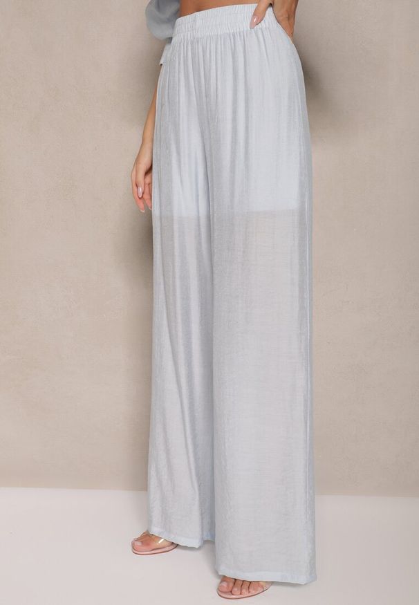 Renee - Jasnoniebieskie Spodnie Palazzo High Waist z Szeroką Nogawką i Gumką w Talii Jenarielis. Okazja: na co dzień. Stan: podwyższony. Kolor: niebieski. Styl: casual