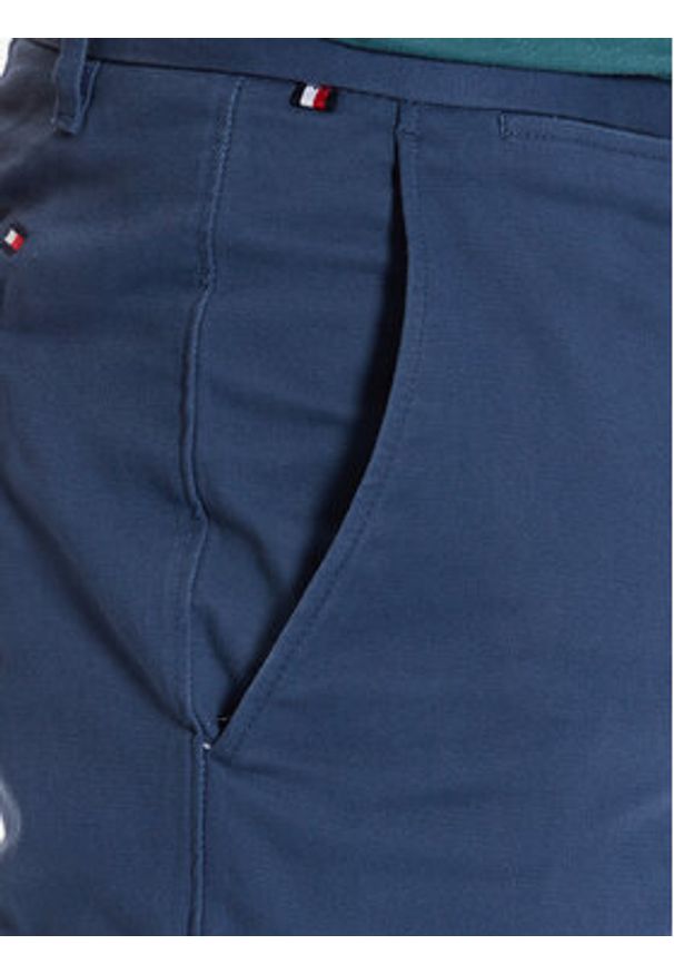 TOMMY HILFIGER - Tommy Hilfiger Chinosy Bleecker MW0MW26619 Granatowy Slim Fit. Kolor: niebieski. Materiał: bawełna