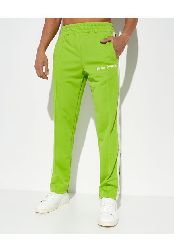 PALM ANGELS - Neonowe zielone spodnie dresowe. Kolor: zielony. Materiał: dresówka