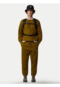 The North Face Spodnie dresowe Essential NF0A8A6J Zielony Relaxed Fit. Kolor: zielony. Materiał: bawełna