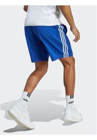 Adidas - adidas Szorty sportowe Essentials Chelsea IC1487 Niebieski Regular Fit. Kolor: niebieski. Materiał: syntetyk. Styl: sportowy
