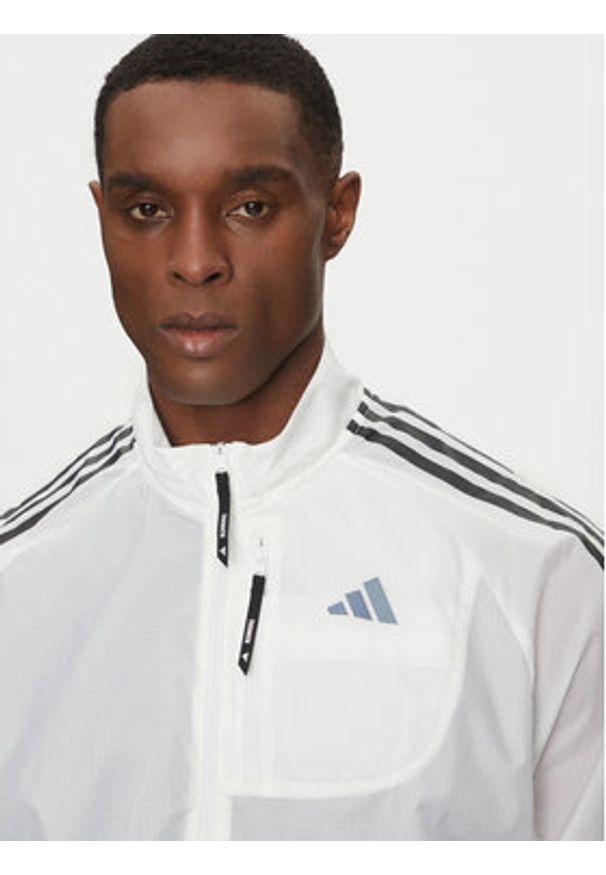 Adidas - adidas Kurtka do biegania Own the Run 3-Stripes JD7760 Biały Slim Fit. Kolor: biały. Materiał: syntetyk. Sport: bieganie