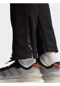 Adidas - adidas Spodnie dresowe Tiro Suit-Up Advanced Tracksuit Bottoms IB2306 Czarny Regular Fit. Kolor: czarny. Materiał: syntetyk #7