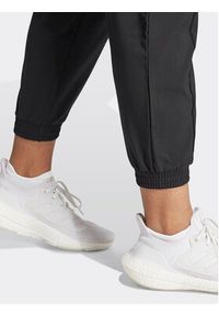 Adidas - adidas Spodnie dresowe Train Essentials Minimal IJ5923 Czarny Regular Fit. Kolor: czarny. Materiał: syntetyk #9