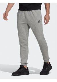 Adidas - adidas Spodnie dresowe Essentials Fleece HL2230 Szary Regular Fit. Kolor: szary. Materiał: bawełna