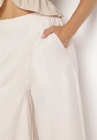 Born2be - Beżowe Szerokie Spodnie Bawełniane Camprell. Kolor: beżowy. Materiał: bawełna
