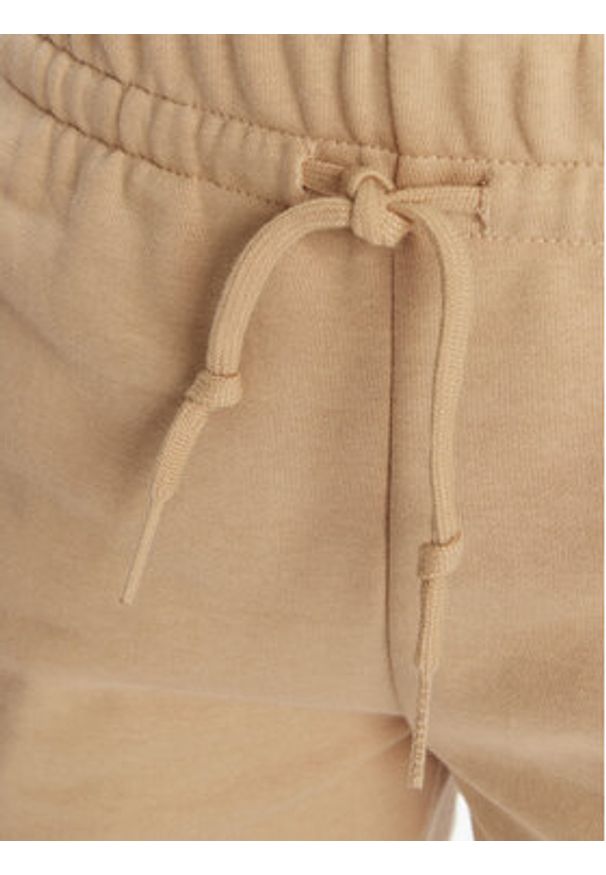 Adidas - adidas Spodnie dresowe Essentials 3-Stripes JX7661 Beżowy Regular Fit. Kolor: beżowy. Materiał: bawełna