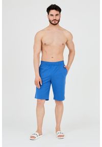 EA7 Emporio Armani - EA7 Niebieskie shorty męskie z małym logo. Kolor: niebieski. Materiał: bawełna. Długość: krótkie #7