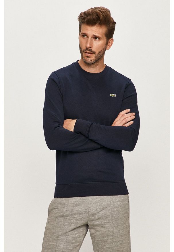 Lacoste bluza. Okazja: na co dzień. Kolor: niebieski. Wzór: aplikacja. Styl: casual