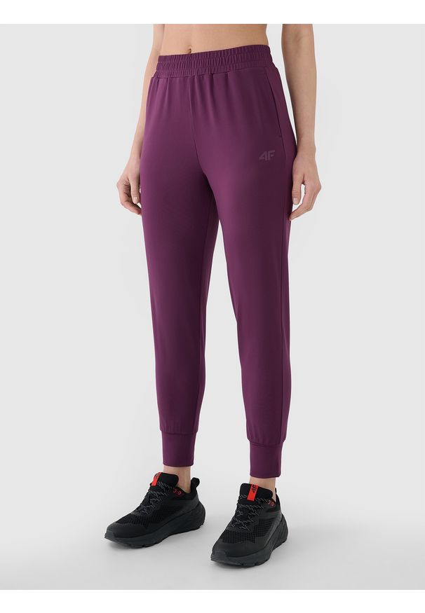 4f - 4F Spodnie treningowe szybkoschnące damskie - fioletowe XXL. Kolor: fioletowy. Materiał: dzianina, elastan, włókno, syntetyk, materiał. Wzór: jednolity, ze splotem. Sport: fitness