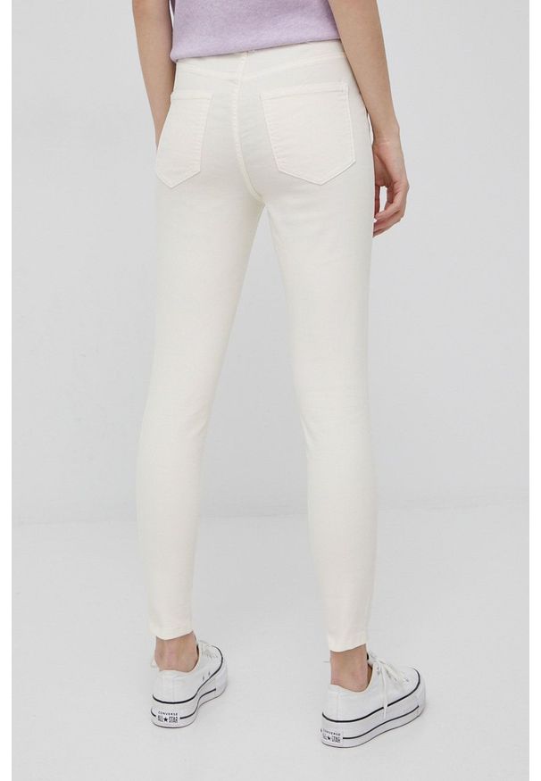 Vila jeansy damskie medium waist. Kolor: beżowy