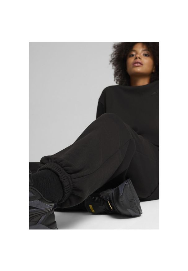 Puma - Spodnie dresowe unisex Essentials Elevated PUMA Black. Kolor: czarny. Materiał: dresówka
