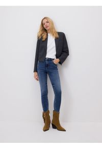 Reserved - Jeans slim fit mid rise - niebieski. Kolor: niebieski
