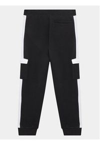 Guess Spodnie dresowe L3YQ12 KA6R3 Czarny Relaxed Fit. Kolor: czarny. Materiał: bawełna