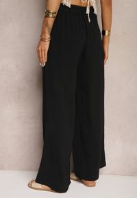 Renee - Czarne Spodnie w Stylu Alladynek High Waist Wykończone Gumką w Pasie Riselma. Okazja: na co dzień. Stan: podwyższony. Kolor: czarny. Styl: sportowy, casual #4