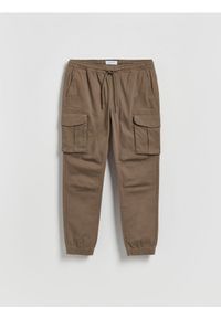 Reserved - Spodnie jogger cargo - beżowy. Kolor: beżowy. Materiał: bawełna, tkanina #1