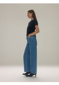 Reserved - Jeansy wide leg - niebieski. Kolor: niebieski