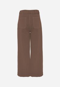 Born2be - Brązowe Bawełniane Jeansy o Szerokim Kroju z Wysokim Stanem Kyltyse. Okazja: do pracy, na co dzień. Stan: podwyższony. Kolor: brązowy. Długość: krótkie. Styl: casual #6