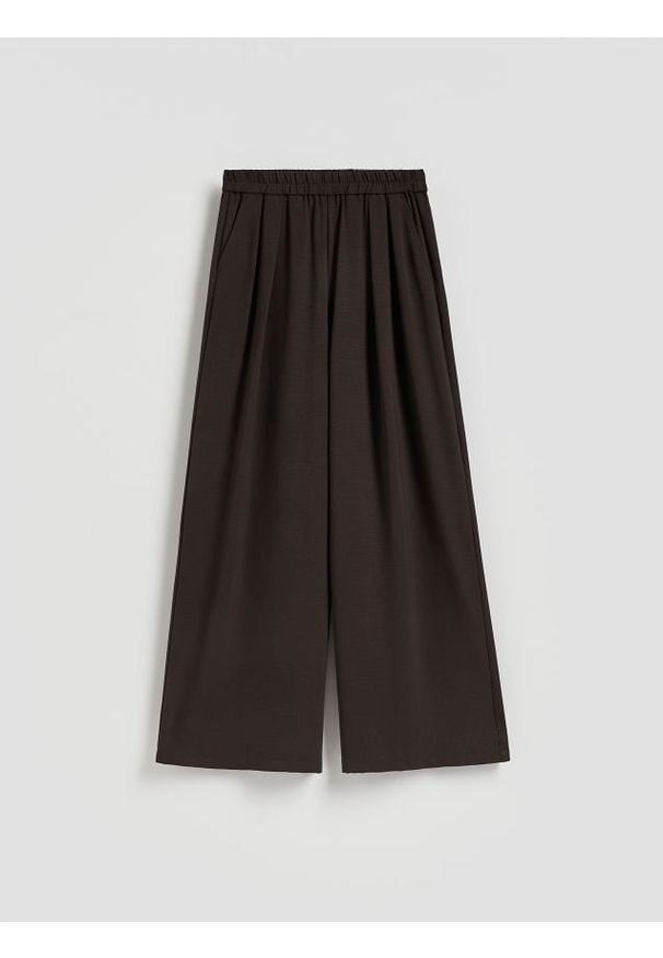 Reserved - Szerokie spodnie - brązowy. Kolor: brązowy. Materiał: tkanina. Wzór: gładki