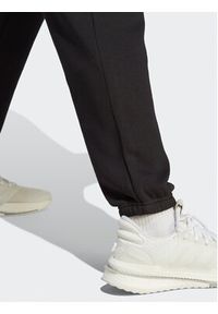 Adidas - adidas Spodnie dresowe All SZN Fleece IB4048 Czarny Regular Fit. Kolor: czarny. Materiał: dresówka, bawełna #6