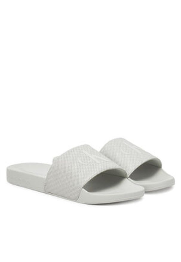 Calvin Klein Jeans Klapki Slide Aop Print YM0YM01269 Szary. Kolor: szary. Wzór: nadruk