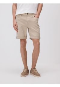 Reserved - Jeansowe szorty slim fit - beżowy. Kolor: beżowy. Materiał: jeans #1