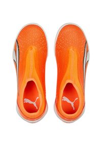 Buty Puma Ultra Match Ll It Mid Jr Ultra, Dzieci. Kolor: pomarańczowy. Materiał: materiał. Sport: piłka nożna