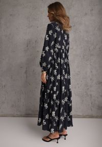 Renee - Niebieska Wiskozowa Sukienka o Rozkloszowanym Kroju z Guzikami przy Dekolcie Seave. Okazja: na co dzień. Kolor: niebieski. Materiał: wiskoza. Wzór: nadruk. Typ sukienki: rozkloszowane, oversize. Styl: boho, casual #8